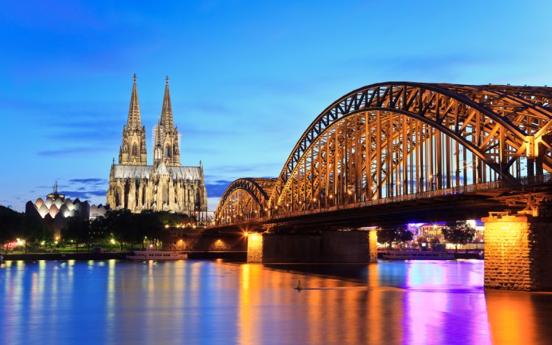 Cologne dom and city skyline at night.